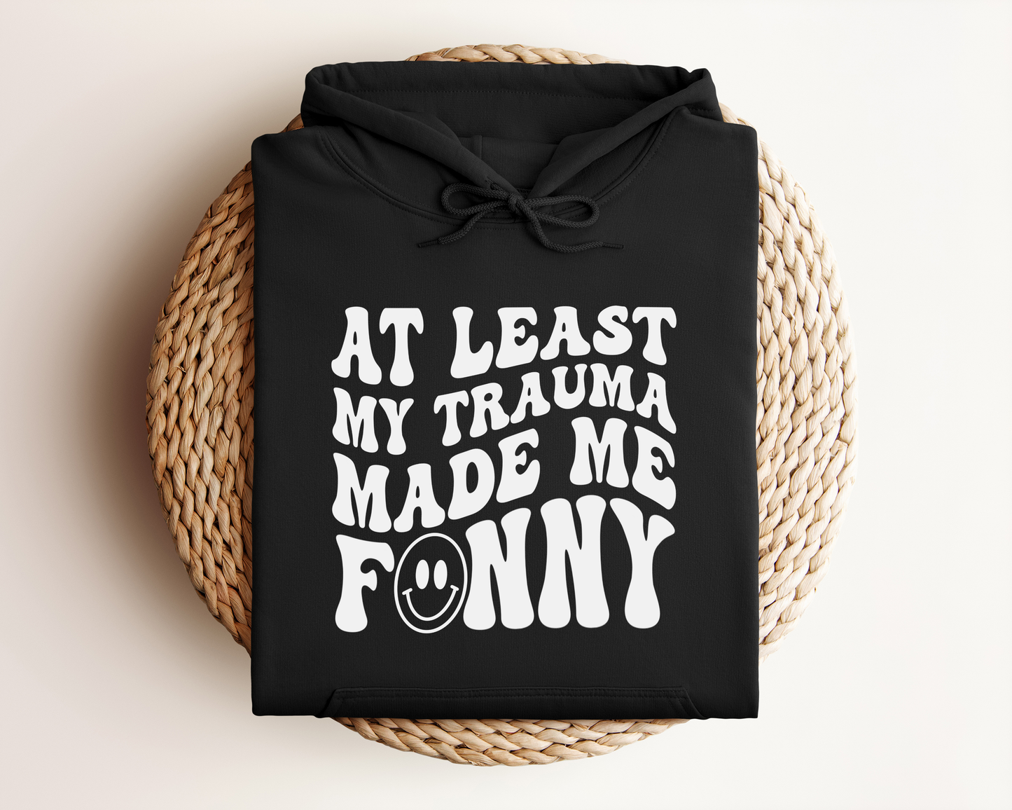ATLEAST MY TRAUMA MADE ME FUNNY HOODIE