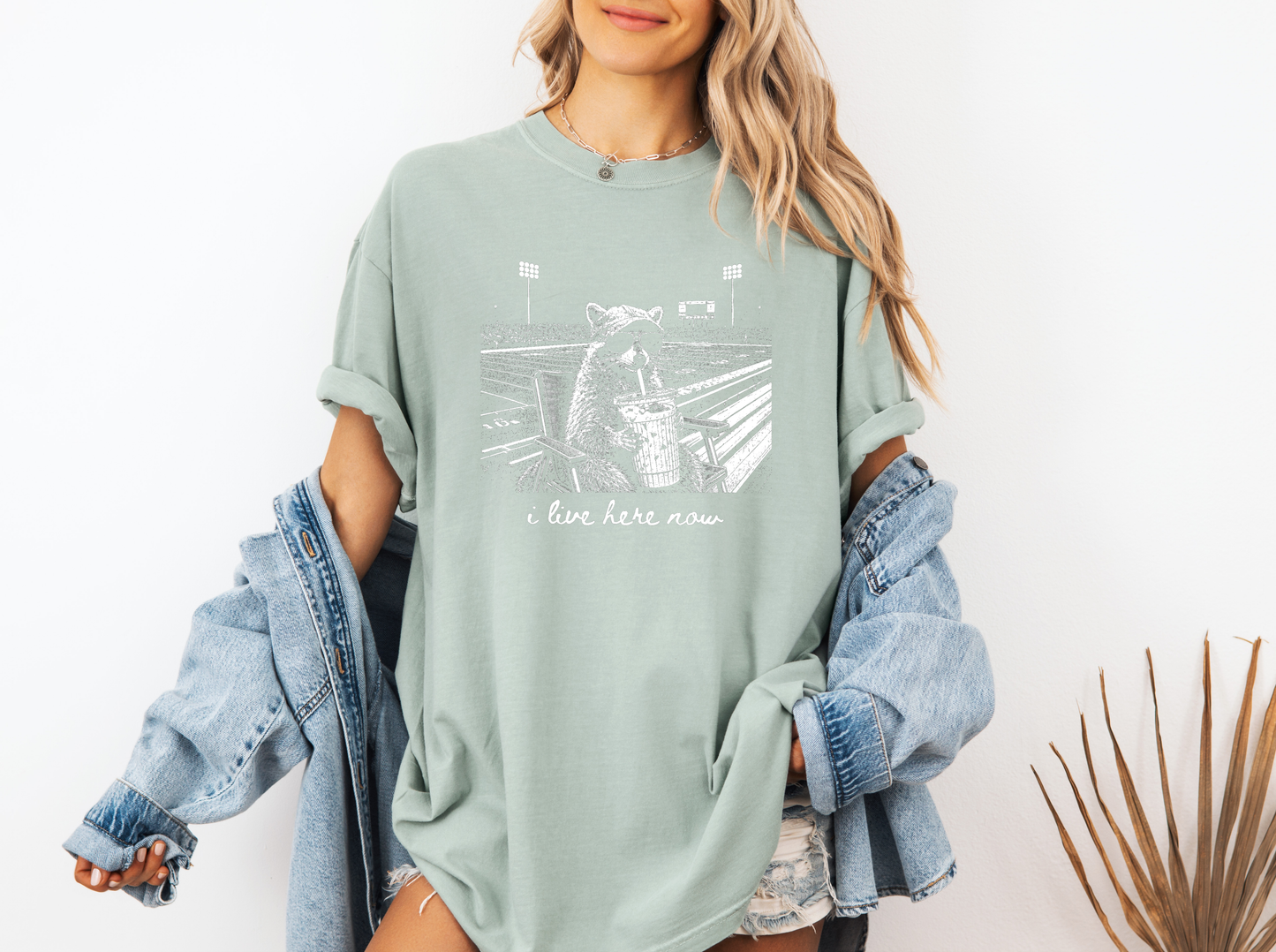 *NEW* I LIVE HERE NOW FOOTBALL RACCOON CC SHIRT