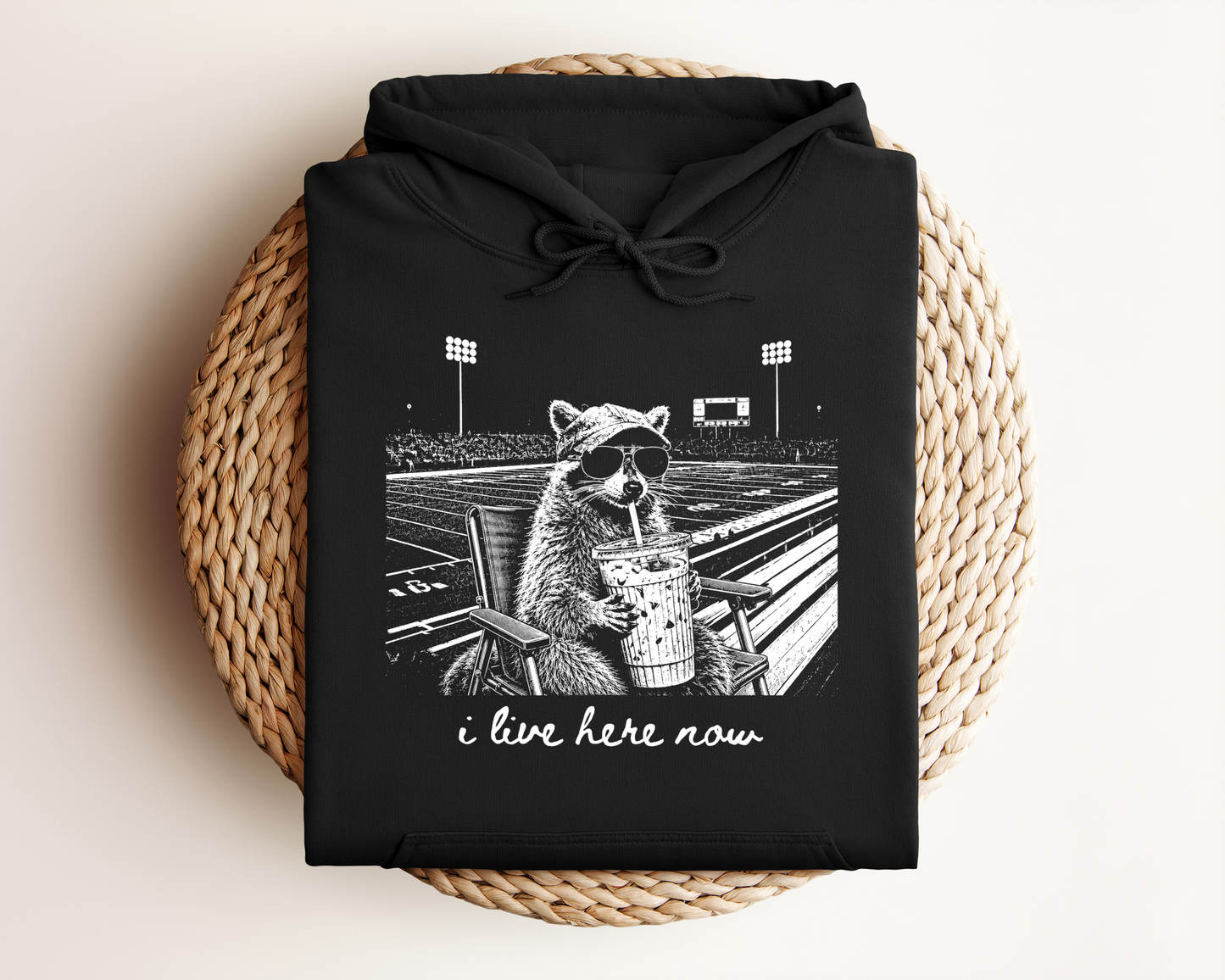 I LIVE HERE NOW FOOTBALL RACOON HOODIE