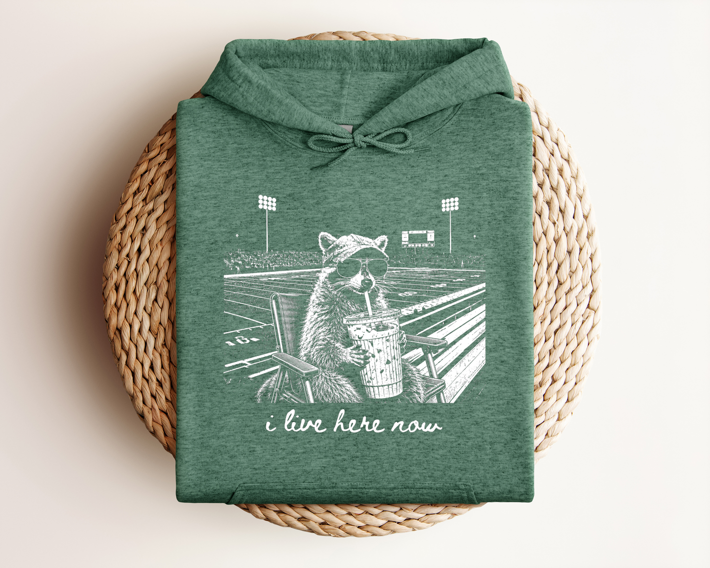 I LIVE HERE NOW FOOTBALL RACOON HOODIE