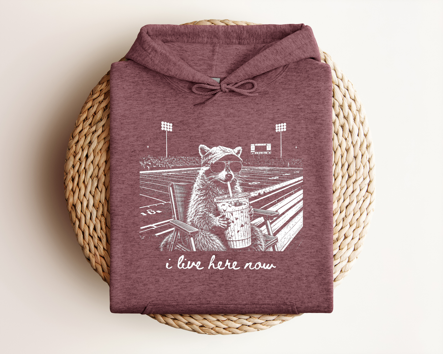 I LIVE HERE NOW FOOTBALL RACOON HOODIE