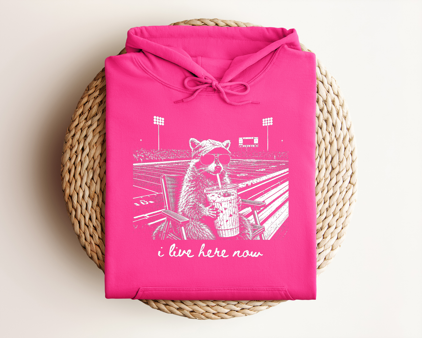 I LIVE HERE NOW FOOTBALL RACOON HOODIE